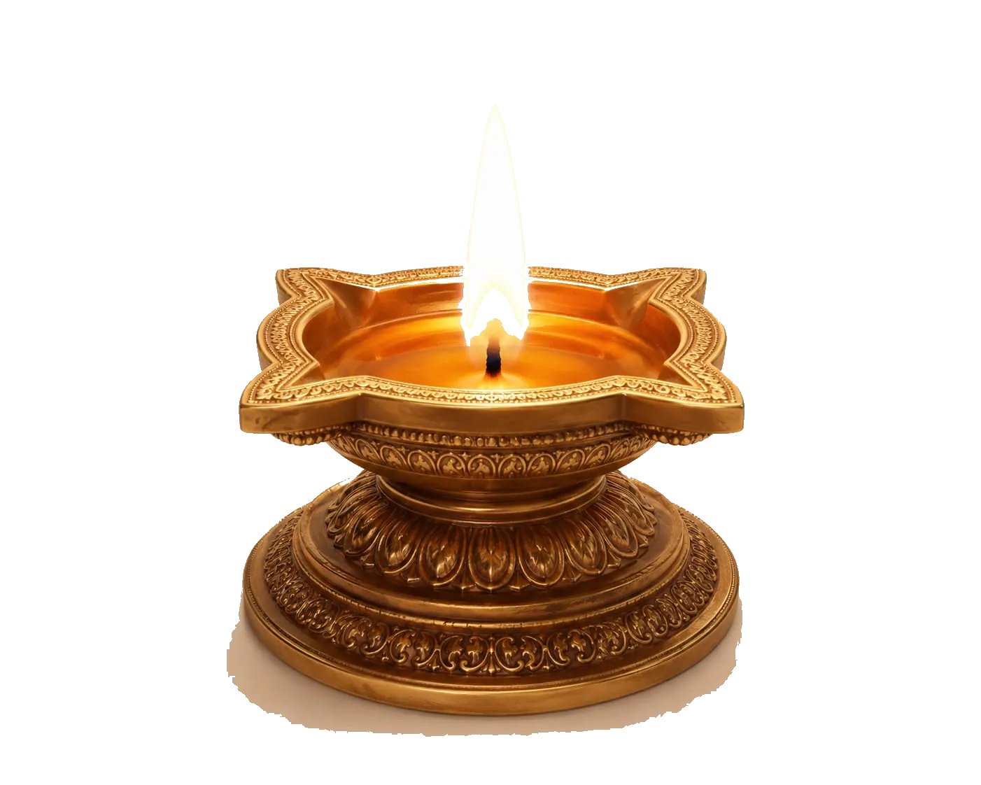 A lit brass diya